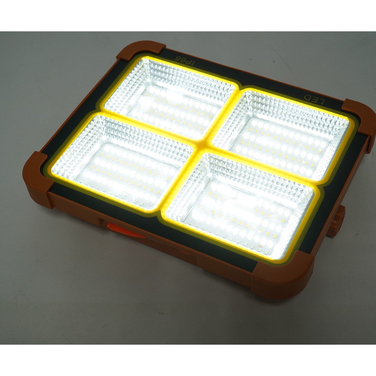 Hordozható LED projektor 200W napelemes panellel 3W, 12000mAh akkumulátor, 6 világítási mód, mágnes, kampó, USB Power Bank Breckner Germany